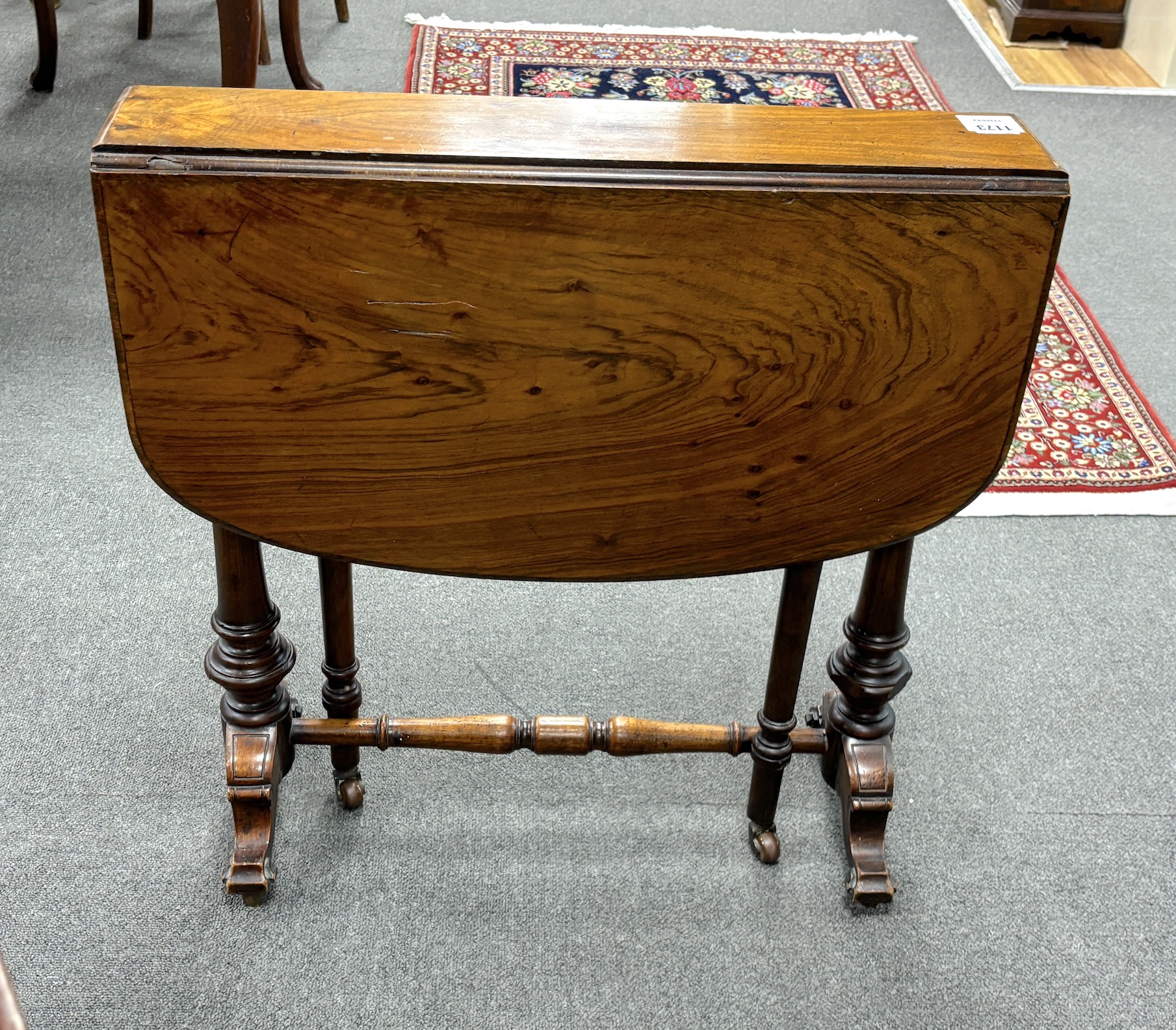 A Victorian walnut Sutherland table, width 63cm, height 63cm